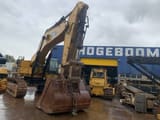 2010 Caterpillar 385CL crawler excavator, front three-quarter view
