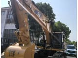 2023 Caterpillar 330D2L crawler excavator, front three-quarter view