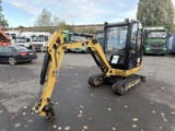 2013 Caterpillar 302.2D mini excavator, front three-quarter view