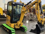 2024 Caterpillar 302CR mini excavator, front three-quarter view