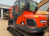 2019 Doosan DX60 crawler excavator, rear three-quarter view
