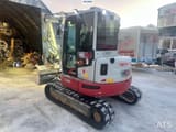 2021 Takeuchi TB257FR crawler excavator, rear three-quarter view