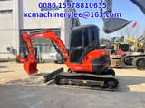 2023 Kubota U55-4 mini excavator, side view