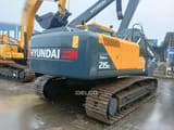 2026 Hyundai Robex 215L SMART PLUS crawler excavator, rear three-quarter view