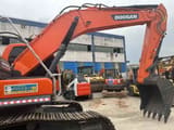 2024 Doosan DX225LC-9C crawler excavator, side profile view