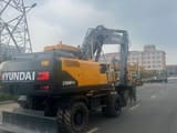 2023 Hyundai R210W-9S wheel excavator rear three-quarter view