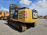 2015 Caterpillar 323EL crawler excavator, rear three-quarter view