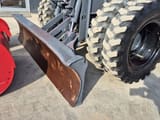 2021 Takeuchi TB295W wheel excavator dozer blade and tire detail