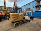 2018 Caterpillar 305.5E2 crawler excavator, rear three-quarter view
