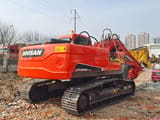 2024 Doosan DX225LC-9C crawler excavator, rear three-quarter view