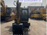 2023 Caterpillar 305.5E2 mini excavator, front view