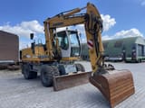 2004 Liebherr A900C HD LITRONIC wheel excavator, front three-quarter view