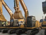 2024 Caterpillar 320GC crawler excavator, front three-quarter view