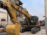 2022 Caterpillar 329D2 crawler excavator, front three-quarter view