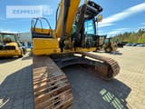 2023 Caterpillar 330-07 crawler excavator, low-angle side view