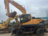 2023 Hyundai 210w-9 wheeled excavator, side profile view
