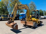 2011 Komatsu PW118 MR-8 wheel excavator side view