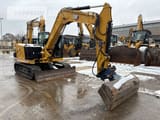 2021 Caterpillar 308-07A mini excavator, front three-quarter view