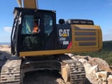 2014 Caterpillar 336E crawler excavator side view