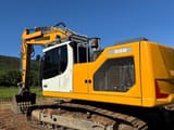 2024 Liebherr 926 excavator, rear three-quarter view