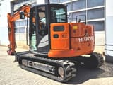 2023 Hitachi ZX85USB-6 mini excavator, rear three-quarter view