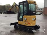 2022 Caterpillar 302CR mini excavator, rear three-quarter view