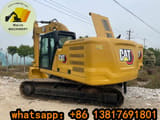 2023 Caterpillar 320 crawler excavator, rear three-quarter view