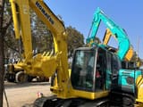 2022 Komatsu 56-7 crawler excavator, front three-quarter view