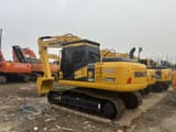 2022 Komatsu PC160 crawler excavator, rear three-quarter view