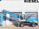 2013 Fuchs MHL335 E material handler, side view