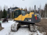 2013 Volvo EC180DL crawler excavator, rear three-quarter view