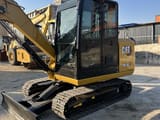 2023 Caterpillar 305.5E2 mini excavator, side view