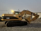 2022 Caterpillar 320C excavator, side profile view