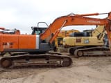 2012 Hitachi Zaxis 210LC crawler excavator, side view