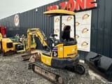 2019 Komatsu PC26MR-3 mini excavator rear three-quarter view