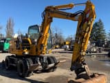 2012 New Holland MH 2.6 wheel excavator, side view