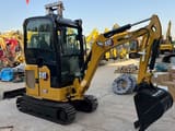 2025 Caterpillar 302 mini excavator, side view