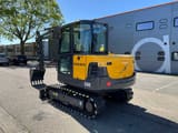 2011 Volvo EC60C mini excavator, rear three-quarter view