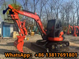 2024 Kubota KX057-4 mini excavator, side view