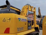 2024 Komatsu PC110 crawler excavator, rear three-quarter view