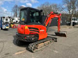 2018 Kubota KX042-4 mini excavator, rear three-quarter view