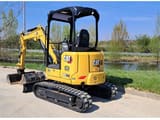 2023 Caterpillar 302.7 crawler excavator, rear three-quarter view