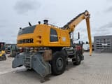2019 Liebherr LH50 material handler, rear three-quarter view