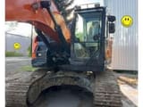 2022 Doosan DX235LCR crawler excavator, front three-quarter view