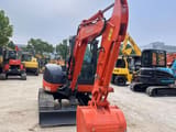 2024 Hitachi ZX50 mini excavator, front three-quarter view