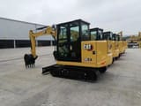 2023 Caterpillar 305.5E2 mini excavator, rear three-quarter view