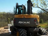 2006 Mecalac 714 MW wheel excavator, rear view