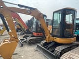 2024 Caterpillar 303.5 mini excavator, front three-quarter view