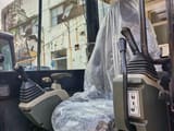 2024 Caterpillar 305.5E2 mini excavator interior cab view