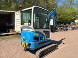 2019 Kubota KX019-4 mini excavator rear three-quarter view